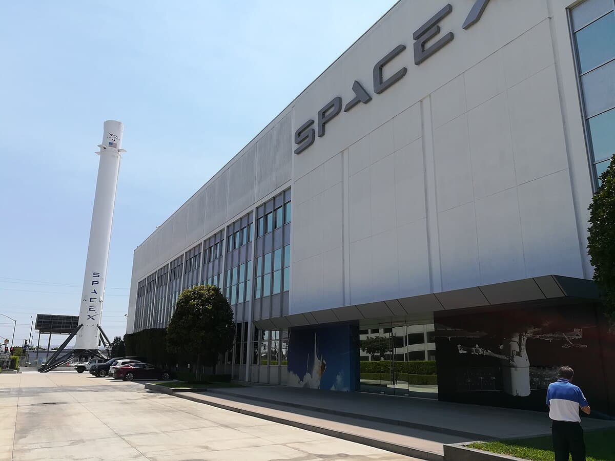 Falcon 9 B1019 stands outside SpaceX's facilities in Hawthorne, CA